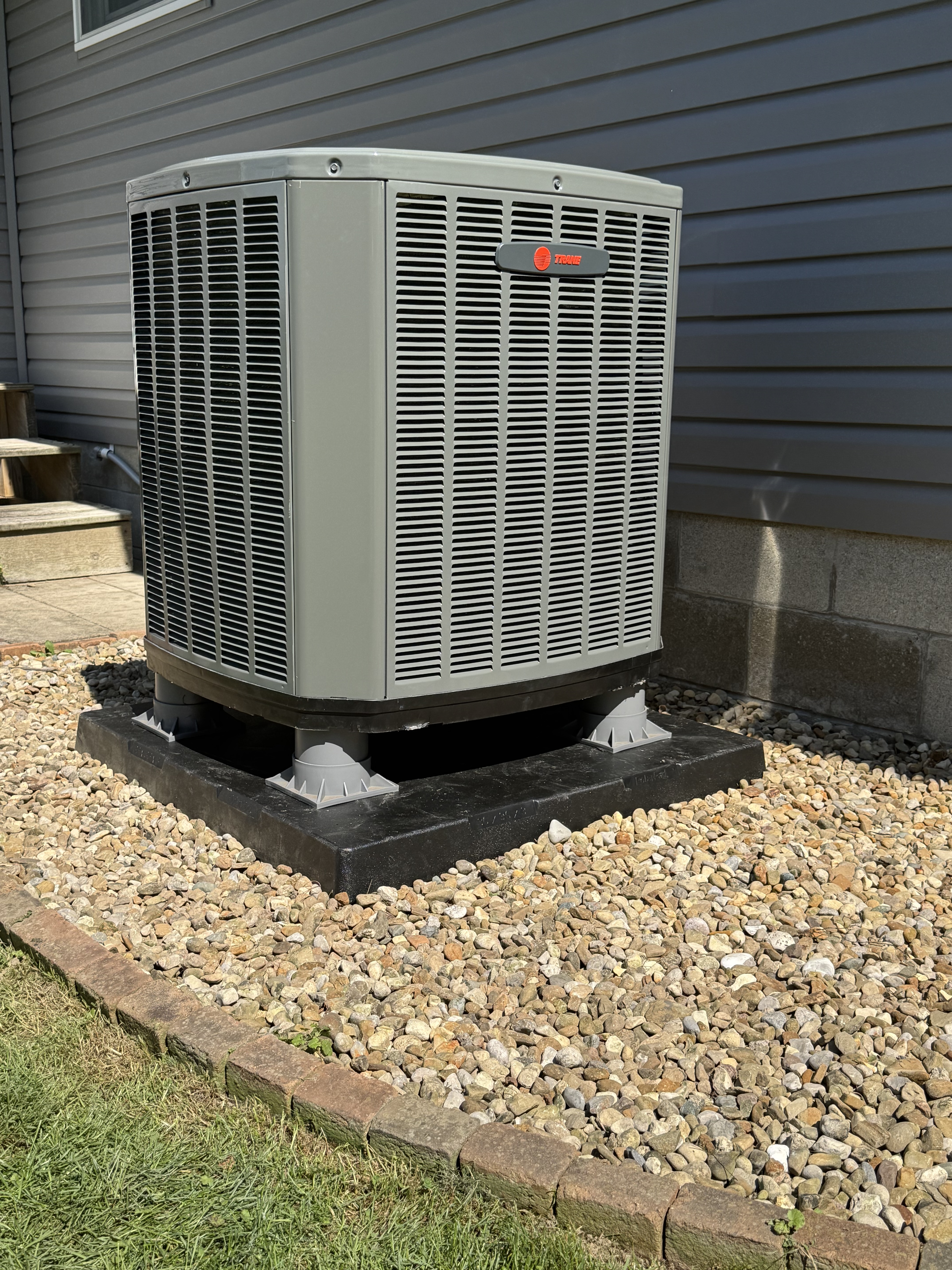 Trane 16 SEER2 heat pump installed on a raised pad at a Mount Vernon, Ohio home